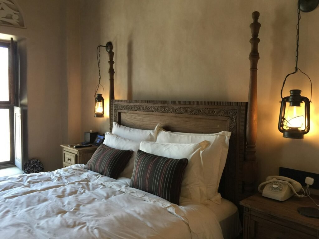 Pillows against a wooden headboard
