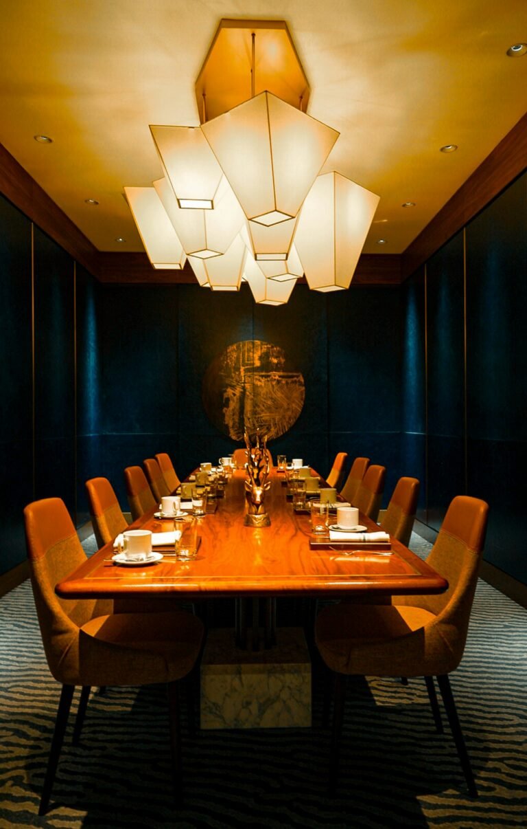 A long wooden table set for a private dinner