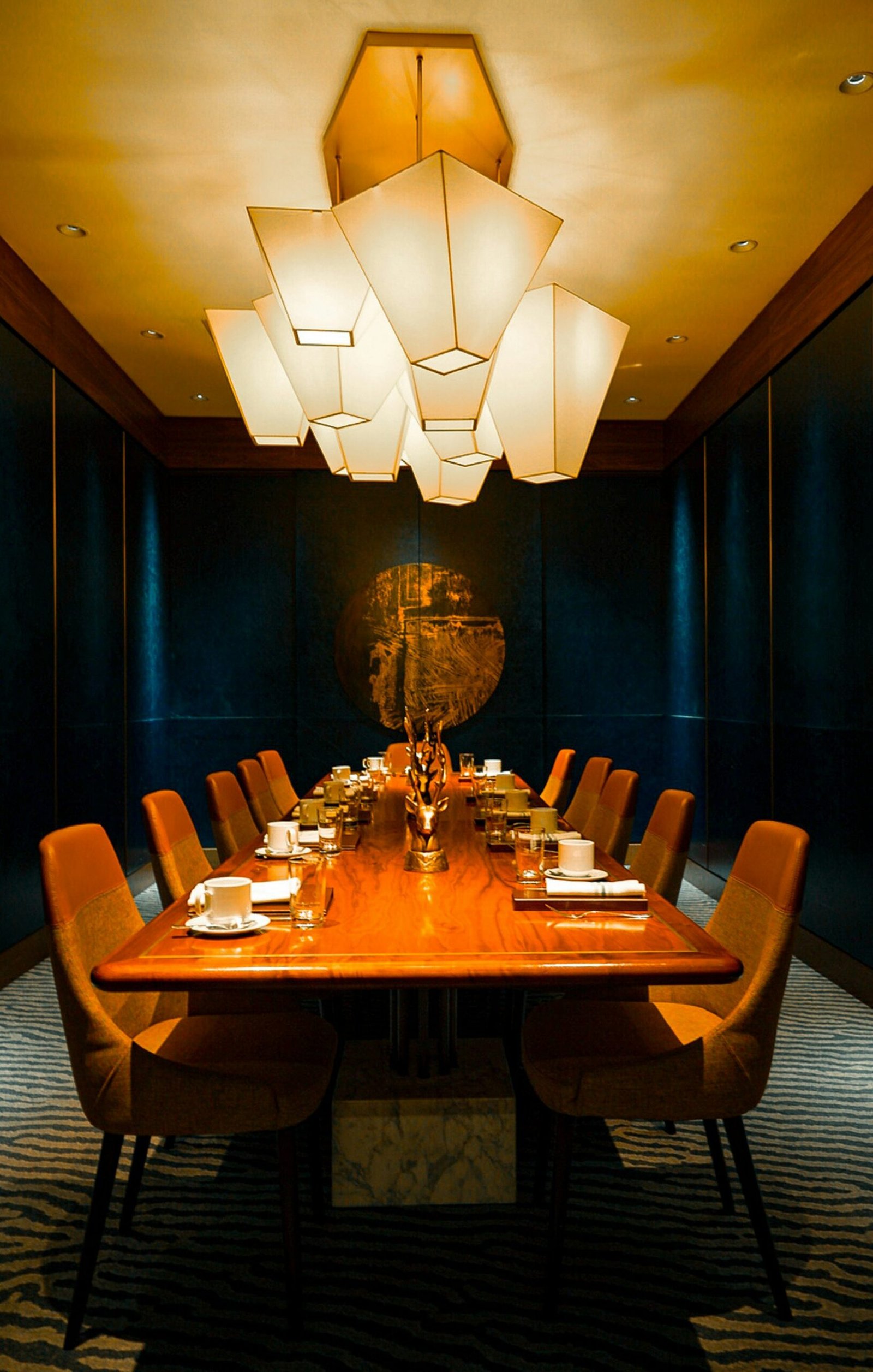 A long wooden table set for a private dinner